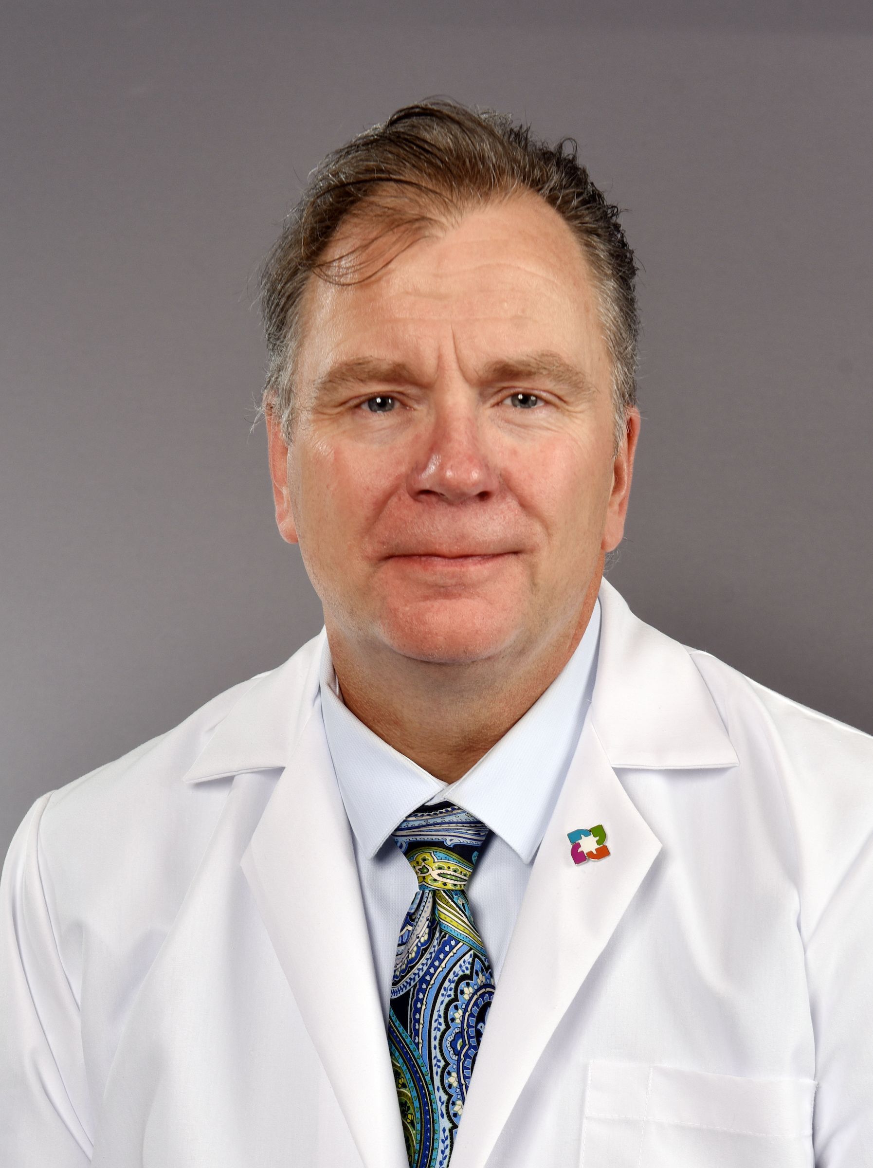 Kevin Maguire, MD, FACS, CPE